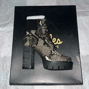 Charles by Charles David snake printed grey and black high heeled combat boot